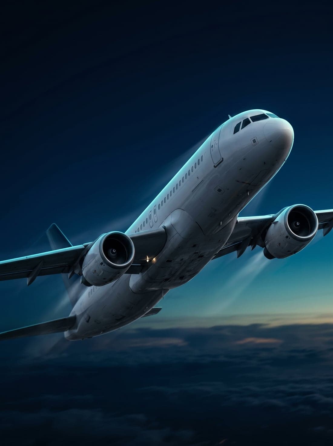 Commercial airliner climbing through a twilight sky